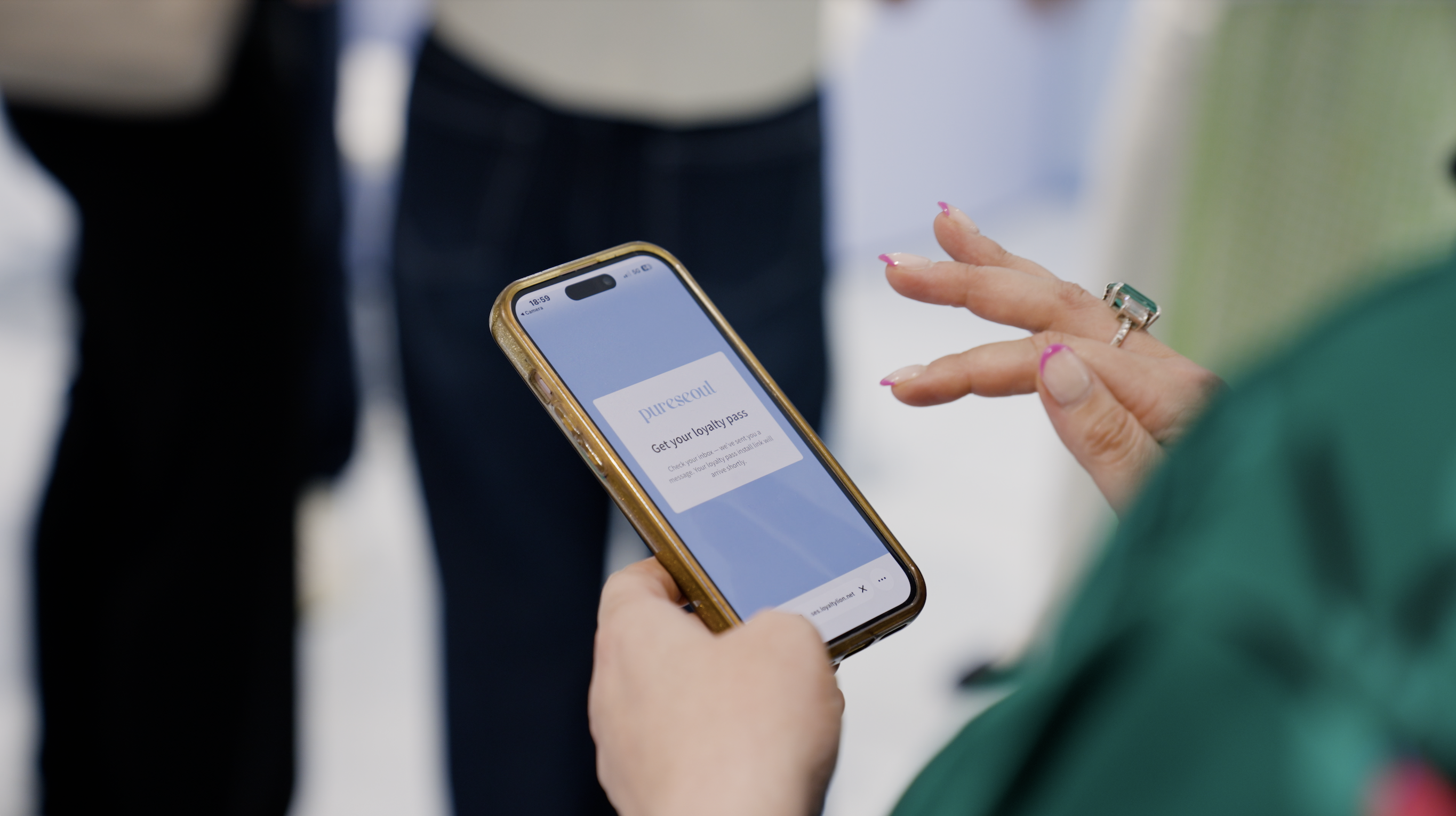 A photo of a Pureseoul shopper downloading their Loyalty Pass